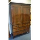 A good Georgian mahogany linen press mounted with