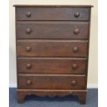 A mahogany chest of five drawers on bracket feet.