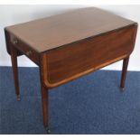 A mahogany Pembroke table on tapering supports. Es