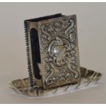 A good quality embossed matchbox holder on tray de