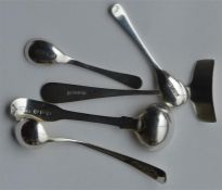 A small collection of cruet spoons, salt spoons et