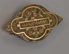 An attractive silver and gold overlay brooch with