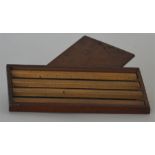 An unusual boxed set of four Stanley rulers with s