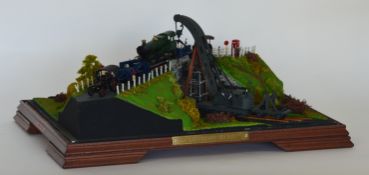 A expertly made model of a railway bridge scene in