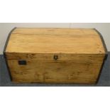 A pine dome top trunk. Est. £30 - £50.