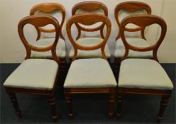 A set of six mahogany hoop back chairs with slip i