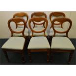 A set of six mahogany hoop back chairs with slip i