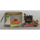 MAMOD: An old steam engine in box. Est. £50 - £80.