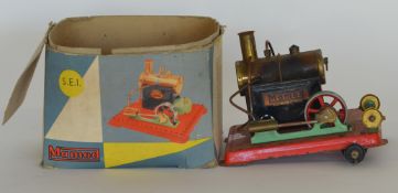 MAMOD: An old steam engine in box. Est. £50 - £80.