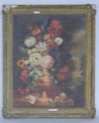 K BARTLE: A framed oil painting of flowers. Approx