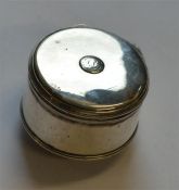 A Georgian circular box with hinged top and reeded