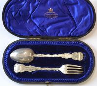 An attractive cased christening spoon and fork wit