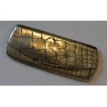 A stylish spectacle case of crocodile skin effect