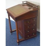 A mahogany lever top Davenport with drawers to sid