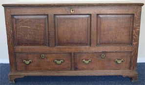An Antique two drawer mule chest on bracket feet a