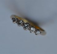 A small diamond five stone ring in 18 carat two co
