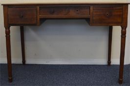 A mahogany three drawer desk. Est. £30 - £50.