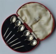 A boxed set of six coffee spoons with reeded termi