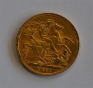 A 1911 sovereign. Est. £170 - £190.