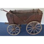 An unusual wagon on tapering supports. Est. £250 -