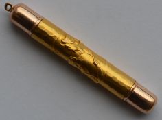 A good quality gold mounted pencil decorated with