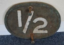 A cast iron number plate, "1/2". Approx. 29 cms wi
