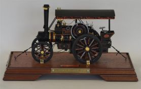 A good cased model of a traction engine in a displ