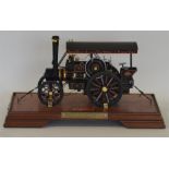 A good cased model of a traction engine in a displ