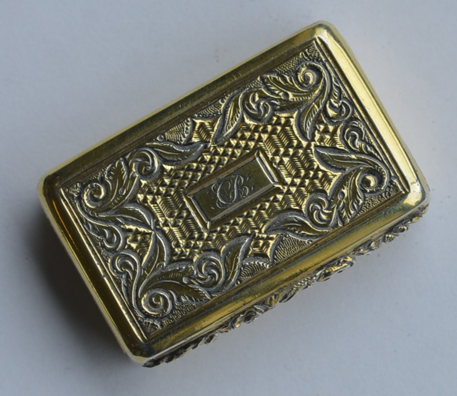 A good quality silver gilt vinaigrette with floral