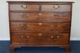 An Antique mahogany chest of drawers on bracket fe