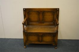 A good oak monk's bench with carved decoration. Es
