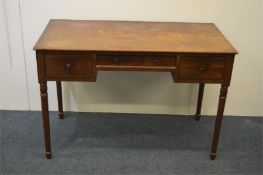 A small mahogany Victorian three drawer desk. Est.