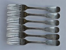 A set of six Georgian fiddle pattern table forks.