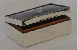 An attractive tortoiseshell mounted cigarette box