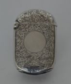 An attractive engraved vesta case with hinged top.