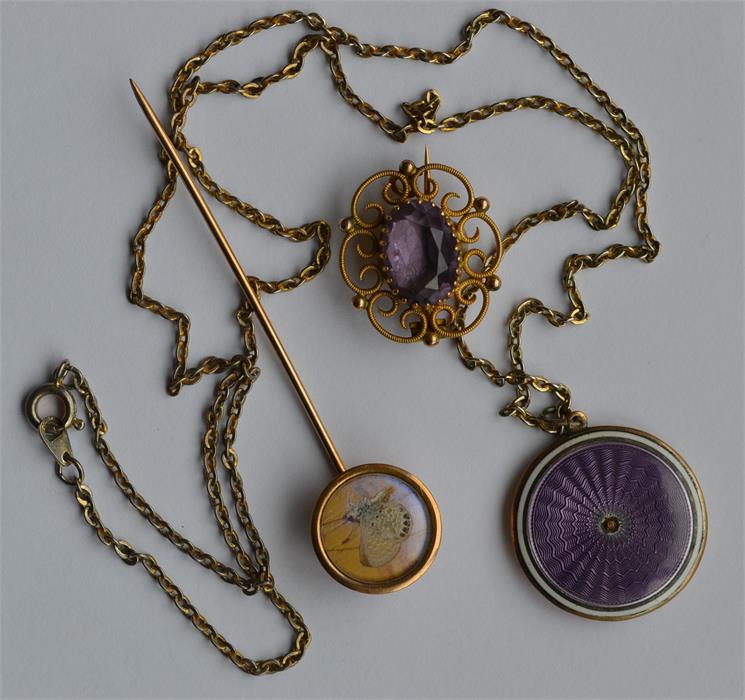 A small gold and amethyst brooch together with a g