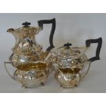 A heavy silver four piece tea and coffee service w