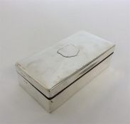 A large rectangular dome top cigarette case, the h