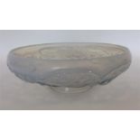 A stylish vaseline glass bowl decorated with flowe