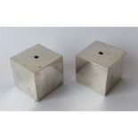 A salt and pepper in the form of cubes with screw-