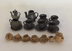 DOLLS HOUSE FURNITURE: An Antique tea service toge