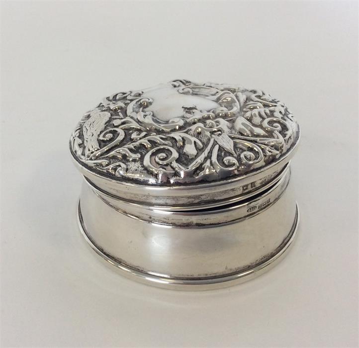 A large circular embossed top ring box with fitted - Image 2 of 2