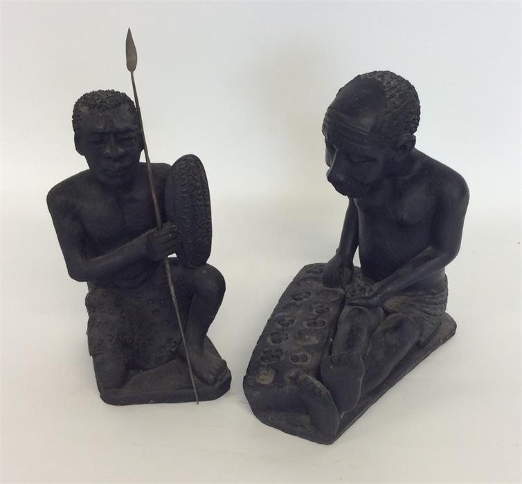 Two terracotta South African figures of hunters wi