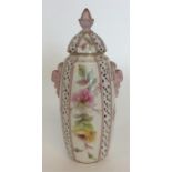 A small Royal Worcester vase decorated with flower