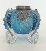 An early glass lustre lamp decorated with fish. (C