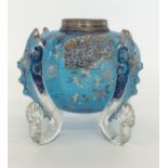 An early glass lustre lamp decorated with fish. (C