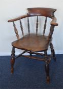A bow back chair with turned spindles. Est. £50 -