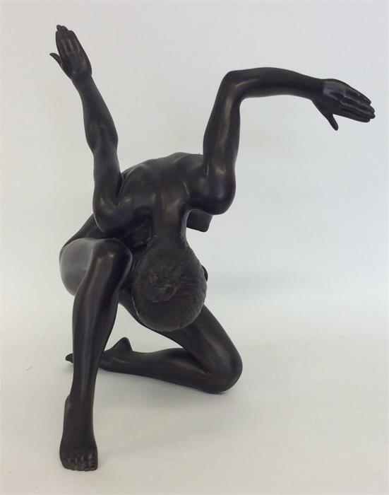 A spelter figure of a lady in dancing position. Es