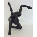 A spelter figure of a lady in dancing position. Es