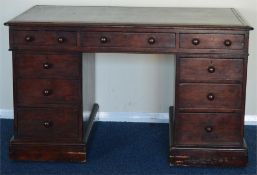 A good mahogany twin pedestal writing desk with le